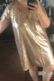 Love the color and this dress feels amazing to wear. The size and density of sequins is very nice and luxe. The fit is very loose and boxy. I ordered my usual size but then couldn't size down because they were sold out. I don't know if it's the most flattering for my curves but I love the way it feels on enough to not care. - Emily H.