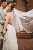 This dress is absolutely gorgeous!! I had a smaller wedding in which I didn't want to spend a lot of money, but still wanted to have a beautiful dress that made me feel like a princess on my big day. This was definitely it! It looked great with and without a veil, was easy to dance in, and felt so comfortable to wear throughout the entire night. I loved how the back had a beautiful train and I had my seamstress add a bustle which worked out perfectly! I also received tons of compliments (one being from a friend that got married just a few months before and spent $3,000 on her dress. She said she wish she would've known about this one!) I cannot day enough good things about this dress! Highly recommend! - Josephina D.