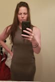 The dress is made of a very comfortable and stretchy material. The cut is flattering. There is a pocket that runs across the stomach and tends to bunch up, but it's easy enough to straighten out. The dress falls a bit shorter on me than it does on the model, but still looks nice. - Alynn M.