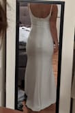 The material is thick and high quality, but also stretchy and super comfortable! With the stretchiness, I sized down, so it really hugs my curves. I was looking for a minimalist, chic dress, and that is exactly what this is!! - Rachel S.