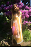 This dress is so unique. The material is so high quality and the wrinkles come out easily. It's a beautiful color and moves in a very interesting way in the breeze. It's so light and perfect for 80, 90 degree weather or hotter. - Natalia Z.
