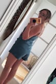This romper is to DIE FOR. 
Denim, adorable, fits perfectly. 
Only complaint is that the hidden zipper is like all hidden zippers and isn't the easiest to zip up and down. Honestly, though, all hidden zippers are like that, it's their hallmark. It's not difficult enough to make me dislike this romper even a little bit. 
Shorts openings are loose *ahem* meaning if you're like me and don't like to get naked in a bathroom stall to pee you can slide the opening of the shorts to the side to pee. No shame.
Please excuse my poor photos, I got so excited coming home to this romper after work I couldn't wait to try it on! - Ashley T.