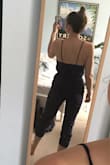 Being tall with a short torso and long legs, jumpsuits are hard. But the straps mean this one works! I saw in a different review that someone adjusted the straps to not be halter-style, and I did the same, and I way prefer it now that the straps are just attached to the back - thanks for the tip haha (see photos). It's not a stretchy material, so it's a bit inflexible when you're sitting down. But not so much that I won't wear it out and about running errands etc all summer. It's great for the price! Might get a burgundy one too. :) - Yosiane W.