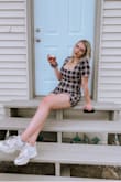A little right on my bust, and yes like a lot of the reviews it runs a little short. I'm very leggy and noticed this but it's not too bad and absolutely do-able. Cannot wait for let this roll over and style for fall and winter with different looks! - Shay R.