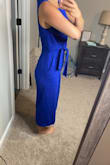 I am OBSESSED with this jumpsuit! It is super cute & fits like a glove. I'm glad I read the reviews because I'm normally a small, but sized down to an XS and it fits perfectly. IT EVEN HAS POCKETS! It's not too tight anywhere and is made of a comfortable material! Love love love this! - Kylee S.