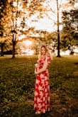 PERFECTION! I wore this for my maternity pictures and it was beautiful! Its night and lightweight which was perfect for mid June in Missouri. I am normally a large pre pregnancy (165lbs)  and I ordered a large for this. This size will work post pregnancy too because of the adjustable ties. I would 100% recommend! For reference in the pictures I am 8 months pregnant (35 weeks) and weighed 190lbs. - Kristin W.