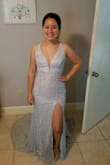 This dress fit perfectly! I selected small and I only need to adjust the length to be able to move around more on my sisters wedding day. It is gorgeous and shines beautifully in indoor lighting. - Abigail M.