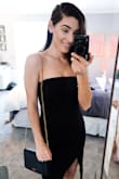 This LBD fit perfectly. I love the slit detail on the side. I paired it with some simple strappy black shoes and it was a perfect outfit for really any occasion. - Kelsey R.