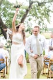 After having to postpone our original wedding and celebration a full year due to Covid, my fiance and I wanted to go on and get married with a "Corona Wedding" in his parents' backyard with just our families and a few close friends. I knew my original, very formal, wedding dress would be too much for a backyard wedding, but I still wanted to feel bridal AND comfortable/relaxed- and this dress was perfect for that! I ordered and tried on both a S and an XS, which were delivered quickly and returned seamlessly. While the S fit okay, the top was a bit too baggy and looked bunched once we got the corset-style back tightened (I'm also not well endowed up top, so I couldn't fill it out. The XS top fit perfectly (I did use sticky boobs just to help shape-wise) and though the XS skirt was a little snug, it was still comfortable and the waistband relaxed to fit perfectly after about 10 minutes. It was the perfect length too- just long enough to me a short train but still easy to walk in. LOVED my 'Rona Wedding Dress! - Madison S.