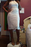 Tried it on and fell in love with the dress, however, the dress is not completely white, it is more ivory with nude under layer. I dress it with an ivory belt I bought on amazon. I can't wait to wear it. - Sheree C.