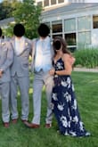 This dress is extremely flattering, comfortable, and high quality. I have worn it many times and always receive compliments and feel amazing. It's a little long for my 5'6" frame, but heels would fix it. Also, since its a wrap dress it is adjustable for all! absolutely LOVE! - Gabrielle K.