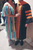 I wore this dress to my husband's hooding ceremony for his graduation. I received compliments all night long. Based on other reviews I ordered a M. The fit overall was great, a little small in the bust area but I have large boobs so I don't blame the dress. If I would've sized up I think the dress would have looked too big. - Melissa M.