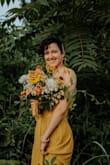I bought this dress to use for a styled elopement shoot (model's measurements above) and it was perfect! The length was maybe a couple of inches too long, but she was wearing hiking boots so that actually worked out fine. The dress was lightweight and comfortable for her to move freely in. The color photographs very well. It's a little bit more clear than what I would maybe consider "mustard" but it is a rich, darker yellow for sure. - Lily H.