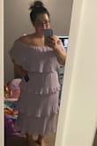 Definitely does not run big. The dress is meant to be flowy and pleated. I ordered a L (lavender) and XL (blue) and i liked the way the XL fit, way better! If you size down, you won't have have as many pleats. I ended up keeping the blue one. Lavender is pretty but a little more plain. - Crystal A.