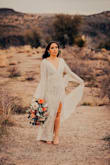 Took engagement pictures with this dress, wanted a dramatic elopement theme to them. I was torn between a small and med. I got the small and it fit me perfectly on top and a little snug on the hips. I was still able to move around in it though! Very good quality as well, and awesome price!! - Audrey H.