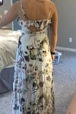 The top part of this dress is very cute and I love the back! But, this dress will require me to hem it because it is so long. - Sydney W.