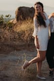 SO many compliments on this dress! It wasn't too tight or too loose. Perfect Elopement dress! The sleeves are gorgeous. I hiked a mile up a hill in this dress (had to wear shorts of course) & didn't get sweaty at all! The dress is very lightweight & airy.. & not see-thru at all! Love love love. - AnaLisa C.