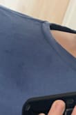 It stains with first wear, looks casual and great but with all the stains just from putting it on it looks horrible!! - Melody S.