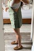 I have an hourglass shape [32 FF, 39" hips w/ booty] and purchased a large based on the others around the same weight/ height but this dress looks like a loose painting smock on me. Unfortunately with the craze of modern times, I totally forgot to request an exchange. I think this would be a super cute maternity dress though, so I'll be saving this  for whenever I become pregnant. [Not anytime soon! Lol]. 

PS- If you're tall, this dress will be super short. I'm 5'4" and the dress is short on me w/ the straps loose. - Bonnie B.
