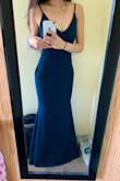 Simply stunning. I bought this for my engagement photo shoot and I'm so excited to wear it! I originally ordered a small, but it ran large. The XS fit absolutely perfectly though, it's a very flattering fit! It hugs in all the right places and the mermaid/trumpet effect of the dress is especially flattering for those of us who are curvier. The exchange process couldn't have been easier too which is always a plus! - Anna K.