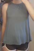 I like this top, it's cute and goes with a good amount of things and is perfect for summer. It's a little tight/uncomfortable around the neck area but I wouldn't size up because it flows out at the bottom and I don't want it to look to big around there. Happy with my purchase. :) - Hannah R.