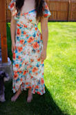 This dress fits perfectly and the color definitely stands out! Zips up easily and looks great. Would definitely recommend! Added bonus is that it is on sale. - Kendra T.