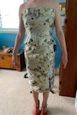 I don't even know where to begin with this monstrosity.  First of all, it is NOT the correct size. There must have been a mistake with the pattern, because it literally has inches of loose fabric on it. The panels on the skirt give absolutely no form, and again the skirt is at least a size medium, if not a large. Essentially you will just end up looking like a couch from the 1950's. DO NOT RECOMMEND! Why oh why did I buy this on sale making it so I cannot return?! - Mackenzie J.