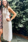 I may have considered ordering a small, but they were out of stock, so I figured a medium would be fine since it was a more form fitting dress anyways. It fit great everywhere except it was a little big/loose under my arms so my bra showed some. It was a last minute purchase, so I didn't have time to go and get it altered, so I just tried safety pinning it under my arms. Regardless, it was beautiful and I got so many compliments on it!!!! - Carley B.
