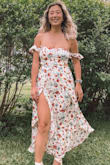 I love this dress so much! It fits true to size and is absolutely gorgeous on! the slits in the legs could be troublesome on windy days but still worth the buy! A must have for this summer! - Emily R.