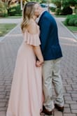 This dress was so perfect for my engagement pictures. It steamed nicely and it couldn't have been more perfect. It was a little long even though I am 5'8". I used some fabric tape to keep the top in place. I cannot get over how stunning it looks in photos. - Summer C.