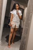 It's just perfect. I'm wearing a size Small and it fits perfectly, not too loose and not to tight just right. - Katherine T.