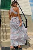 I'm so obsessed with that dress - I bought it for a wedding ceremony. The material is really great and flowing, it was perfect for a wedding ceremony by the beach. I got for myself the size XS, and fits perfect. - Juliana V.