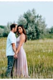 I bought this dress for one of my engagement pic outfits and loved it. It's a very soft pink/purple-ish and romantic which was the look I was going for in our Spring pictures. It was very comfortable, flowy, and didn't require a bra (which is always a plus :) ). Highly recommend. - Katarina C.