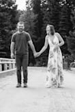 Dress is absolutely beautiful and is made from very high quality material. The snap button wouldn't stay closed, but I adjusted the straps and it worked just fine! Wore it for our engagement pics and I LOVE how they turned out!! - Lexi T.