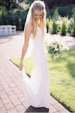 I was so happy with this dress! My wedding was postponed due to you know what and I wanted to save my original dress for next years reception. When I found this dress and tried it on it was the perfect amount of simple and elegant for our immediate family ceremony. :) - Courtney A.