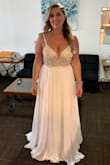 I bought this dress for our elopement after having to postpone our original wedding twice. I absolutely LOVED it! Th beading on the top is absolutely gorgeous and I love that's it's subtly see through. The low v back is so pretty too. It was a little long for me and a tad small in the chest but I was super pressed for time and couldn't have it altered. The dress came in 4 days before we left for our elopement. I highly Recommend this dress! It made me feel like a bride and I felt beautiful in it. - Courtney W.