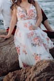 I love the dress it was beautiful. I was able to use it for my engagement photos!! Amazing photos from this amazing dress! - Adriana G.