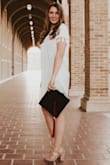 This dress is so fun! I wore this for my grad pics and graduation ceremony. It is true to size and the dress is lined so it is not see through. Oh and the shoes are Lulus also. - Kaitlyn W.