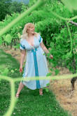 I read the reviews and ordered a medium, which fit much better than I expected it to. My only grievance with the dress was that I was hoping it would look like the one on the model, but unfortunately it seems like if you order a size other than the small or extra small, the gorgeous thick green stripes on the front are switched out for smaller gray ones around the bust. A bit of a let down there.  Also, if you are a chesty girl, like myself, it does have a very deep neckline. I had to sew in a hook and eye so I could successfully wear a bra to keep the girls perky. Although, the material is thick enough that if going braless doesn't bother you, it's no issue!

Overall, I love this dress and I can't wait to wear it again! - Dakota M.