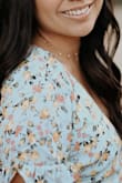 Super cute necklace. Perfect for any occasion and goes with anything! But would definitely ask for help putting it on because it's a little necklace. - Marisol B.