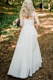 I ordered this for a June 2020 elopement, and I was shocked at how well this dress worked out for me. It was elegant yet simple, perfect for an elopement. Any time I show a wedding photo, I always get a compliment about how pretty the dress looked. It's very good quality for the price, and even my alterations lady said the dress material was solid. I do recommend a few alterations to help make the dress more functional: 1. get the straps in the back 'hard sewn' which means no more of the plastic bra strap looking adjuster. The back of the dress is super plain so I certainly didn't want the plastic adjuster bra strap look for my wedding. 2. Have the front sewn so it doesn't open at all. These were easy alterations but made the dress even better. It photographed super well and moves great when walking. - Robert B.