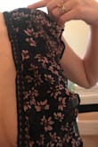 This dress did not disappoint. It looks gorgeous on and is really comfy. I listened to reviews and ordered a size smaller, so I ordered a size XS. The dress is still a bit large/unfitted around my waist. My waist is a size 26 for reference. I'm not sure if around the waist is supposed to be tight or not, but I just wanted you to be aware in case you were wanting the waist to be more fitted. Also, I am a size 32DD (in VS bras) and the XS fits my chest just right. The dress is great quality. I will say that there are some loose threads I need to cut, and the trim around the bust area will need some trimming of parts sticking out and to be steamed to lay flat. Overall, I am extremely happy with this dress and cannot wait to wear it. Highly recommend!! - Makayla B.