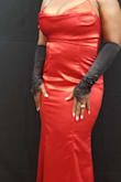 The dress looked amazing on me was a little tight around the hip area.. - Pamela M.