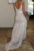 Good quality and comfortable. I made alterations to the dress: I went down front and back, I put pearls on the straps and the back, and I put a ribbon on it. - Ingrid C.