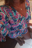 This romper is soooo cute and flirty. My husband loves me in it. It's comfy and loose, yet still manages to be totally flattering. I have a big butt, so I went up a size. I was afraid it would be too baggy and frumpy. But it was still super cute. My favorite outfit for sure!! - Dejeune S.
