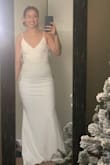I almost want to return my original wedding dress. This was just one I wanted to change into! The material is thick and pretty stretchy. I ordered a small but received an x-small!!(or else 5 stars!) I didn't return it, it fit well! The chest padding is perfect I have no extra padding here! And some wiggle room for some cute heels! - Melanie M.