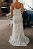 The material is beautiful! It fits comfortably and I do not need to alter it. It is a little long and drags on the floor, but I like it. I love the lace detail at the bottom and how flattering the fit is! - Jordan K.