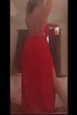 Ordered a size small which is my typical size in flowy dresses and it fit great! I love the red color as well, very vibrant. There is a shorter lining underneath so it's not see through and its still lightweight for summer. The elastic around the waist is snug but not uncomfortable. I was worried about the non-adjustable strings in the back being too loose but they are pretty good, they could be a teeny bit tighter but it doesn't make the fit look bad. I'd recommend this dress! - Jennelle L.