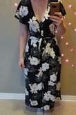 According to the size guide I should order a large for all lulus items but this is too big! It fits my shoulders but the waist is huge and hits too low. And the crotch is like 4 inches below where my crotch is! I'm going to take it to the tailor to see if I can fix this and make it wearable. Looks okay tied up, but there is so much extra fabric in the back and there's lots of gaping where the buttons are. Also didn't realize it would have weird shorts inside it??? Maybe it's the low crotch but I think the short make walking feel weird. - Rachel S.