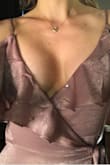 I wasn't super impressed with the material but I do love the color and the idea of the dress. The fit was good except for I kept busting out of the top the little button wouldn't stay closed. length was great. - Chelsea F.